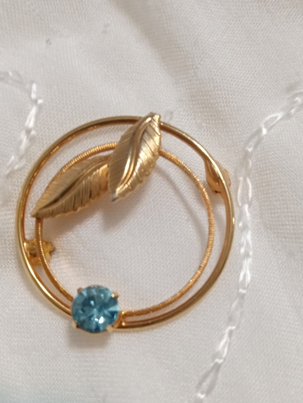 Antique Gold Leaf Circle Brooch with Blue Stone